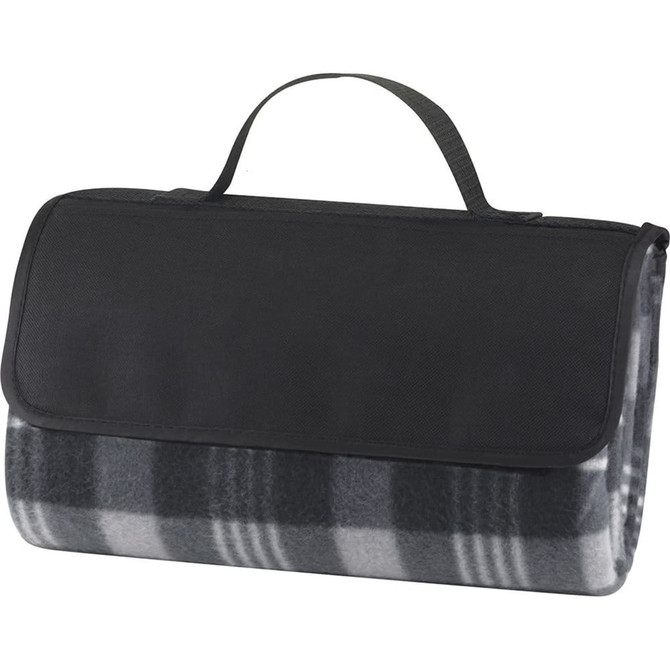A grey and black picnic rug with a flap and carry handle, featuring a checkered pattern. It has a logo on the front.