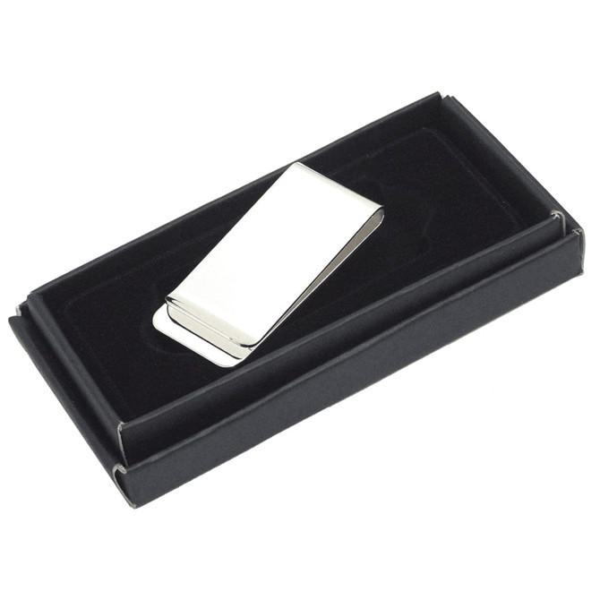 A silver metal money clip displayed in a black gift box with a velvet interior.