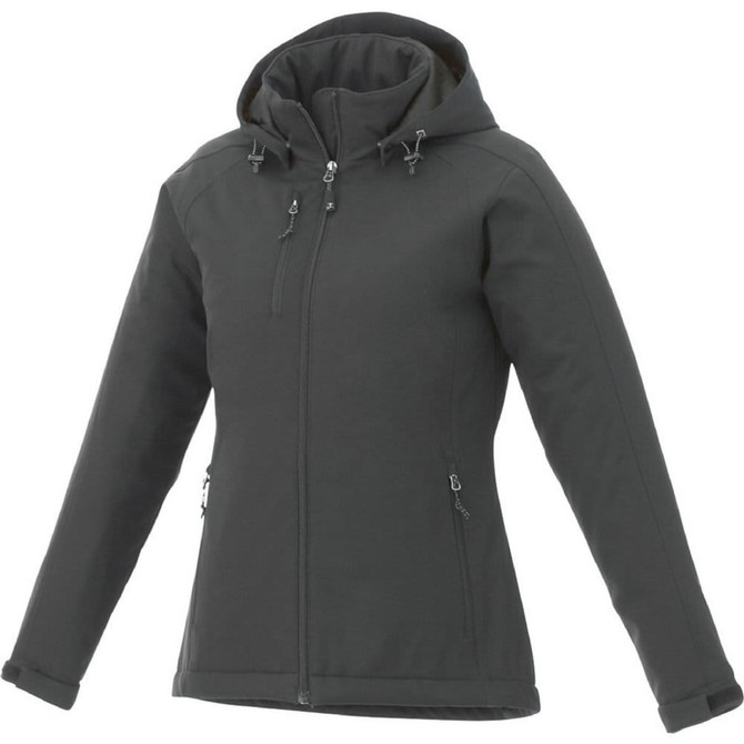 A women's softshell jacket in dark grey featuring a hood and multiple zippered pockets. It has a logo on the fabric.