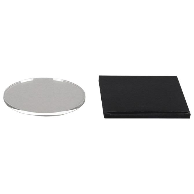 A round glass coaster with a clear surface and a black backing. It features a smooth, reflective finish.