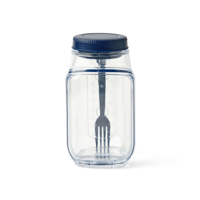 A clear plastic salad jar with a navy blue lid and built-in fork inside. Features measurement markings on the side.