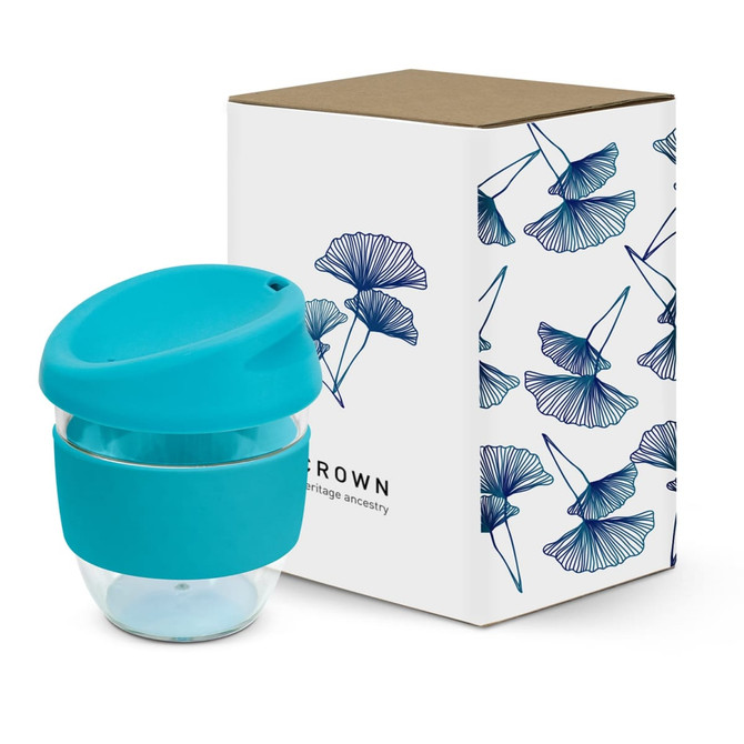 A drink bottle with a turquoise lid and band, paired with a decorative box featuring floral designs.