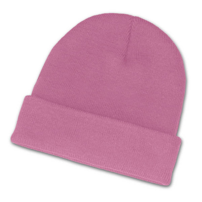 A pink beanie featuring a rolled cuff design.