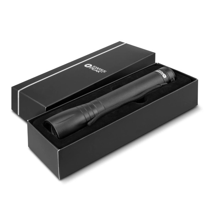 A black Swiss Peak 10W Cree torch in a sleek black box with a fitted interior. The box features a logo.