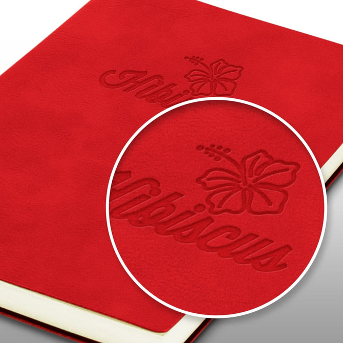 A Genoa Soft Cover Notebook in bright red featuring an embossed hibiscus design and the word "Hibiscus."