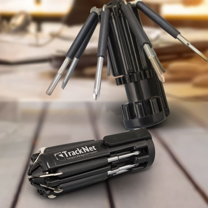 A multi-tool set featuring various tools in a compact black casing, with a branding logo visible.