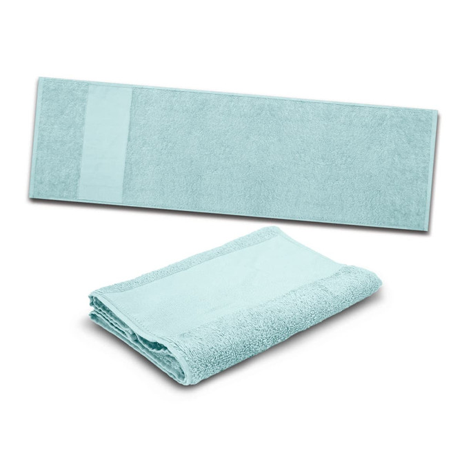 A light blue Enduro Sports Towel is displayed, showcasing its soft texture and generous size, folded for convenience.