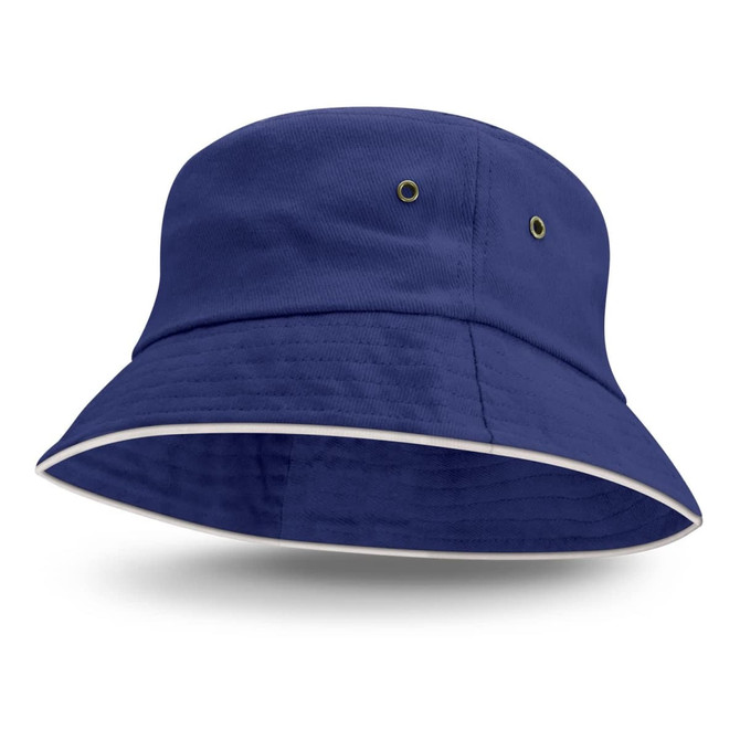 A blue bucket hat with white sandwich trim and ventilation eyelets. It features a simple, classic design.