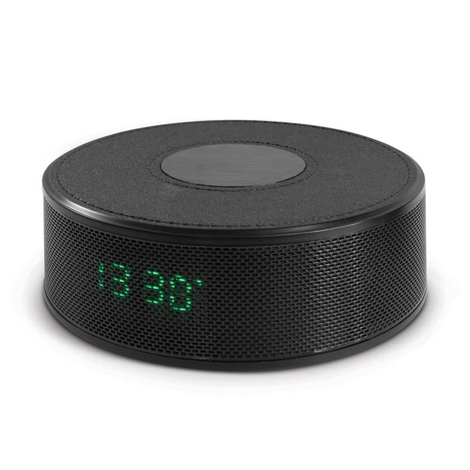 A round black wireless speaker with a textured surface and an LED display indicating time, featuring a logo.