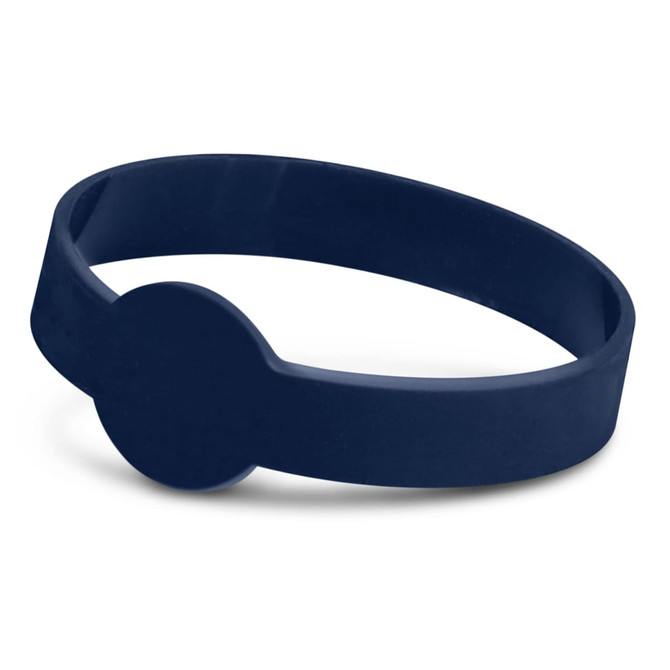 A navy silicone wristband with a debossed design and a rounded feature on the band.