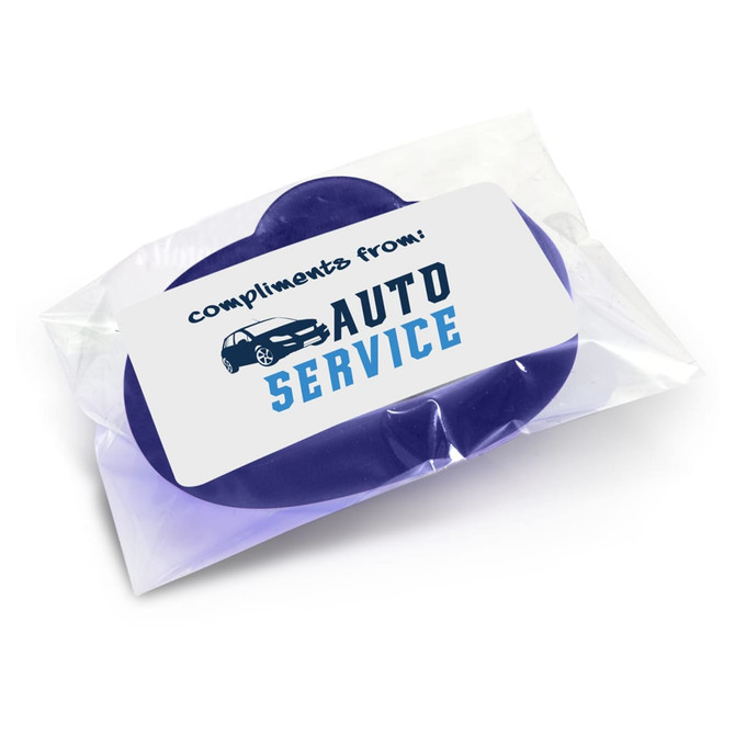 A silicone wristband in purple packaging, featuring a branding label on the front.