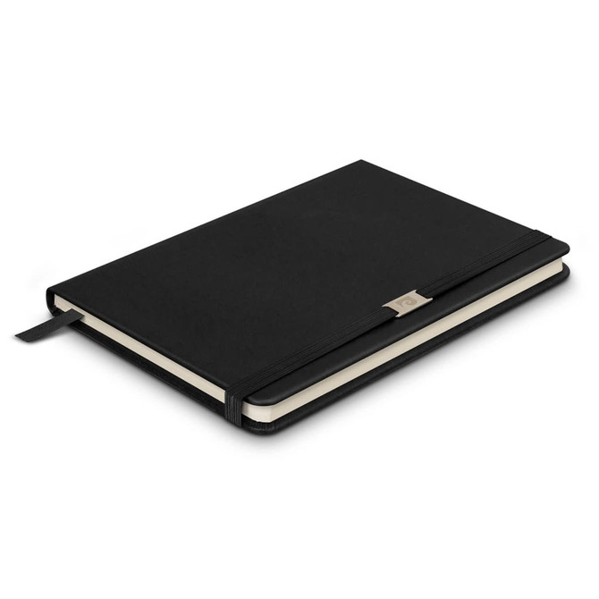 A black notebook with a textured cover, featuring a ribbon bookmark and a branding logo on the front.