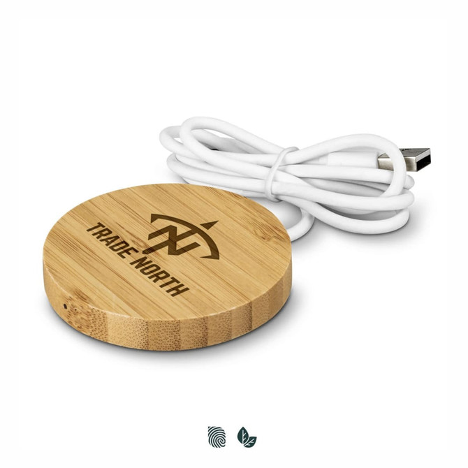 A circular bamboo wireless charger with a USB cable, featuring a logo engraved on the surface.