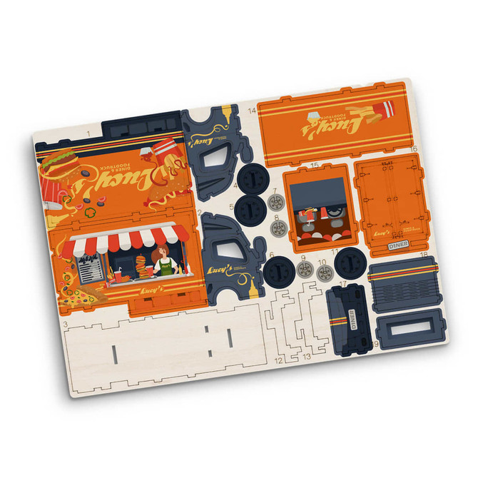 A wooden model kit of a small truck, featuring orange and black parts, including wheels and a shop scene.