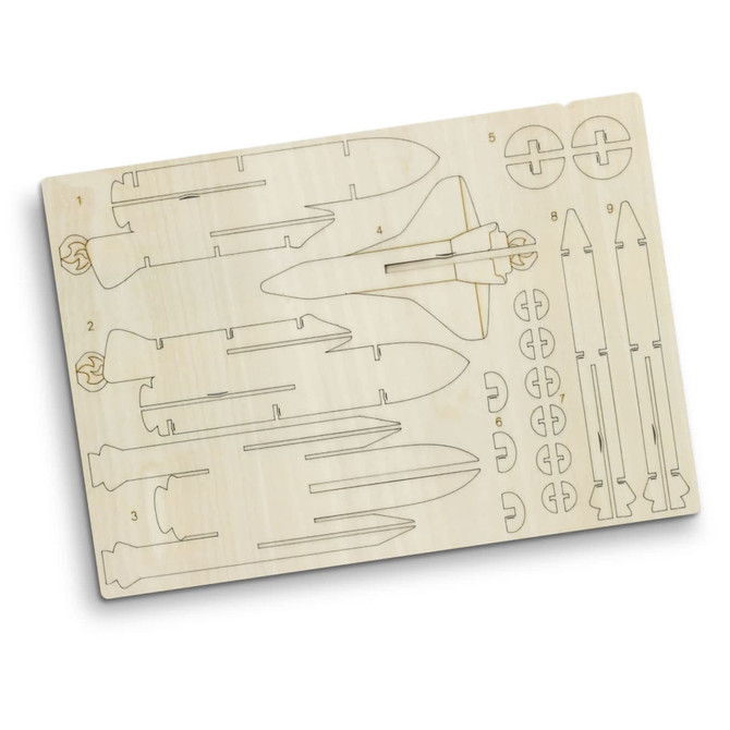 A wooden model kit featuring a rocket ship and rocket parts, with a natural wood finish and precise cutouts.