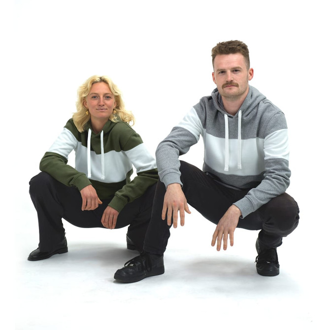 Unisex hoodie in grey and green with a colour-block design, featuring a logo and drawstring hood.