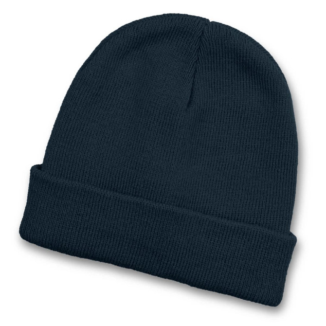 A dark navy beanie with a rolled cuff and textured knit pattern. It features a logo on the side.
