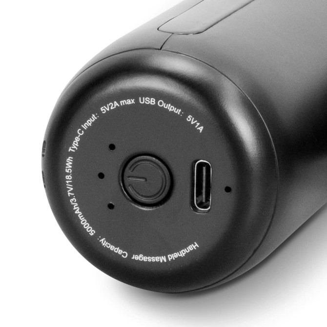 A black handheld massager with a compact design featuring a USB-C input and an on/off button.