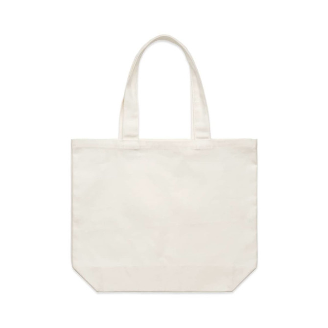 A cream-coloured tote bag with two sturdy handles and a simple design. It has a logo on one side.