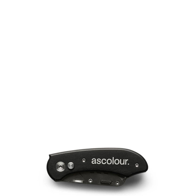 A black utility knife with a folding design and a logo on the handle.