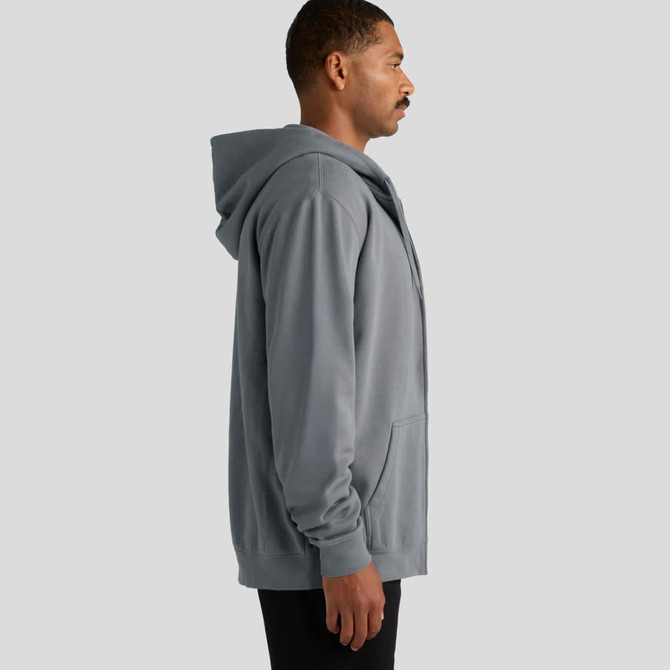 A grey zip-up hooded jumper with a front pocket and a logo on the side, displayed on a model from the side.