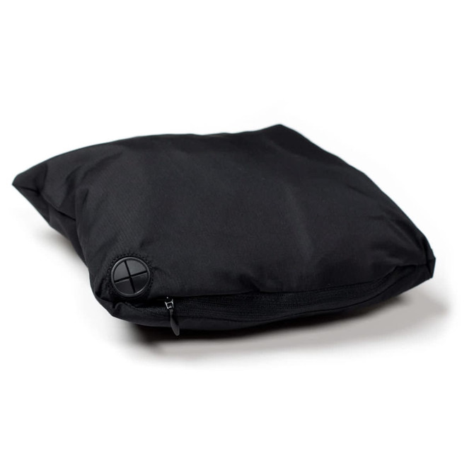 A black Cyrus Windbreaker folded and zipped for easy storage, featuring a logo on one side.