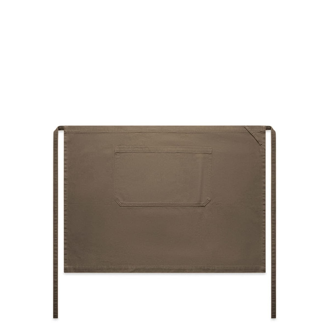 A brown canvas half apron featuring a large pocket and tie straps on both sides.