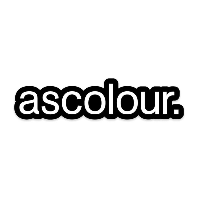 A black logo sticker with rounded edges featuring the word "ascolour." in a bold font.