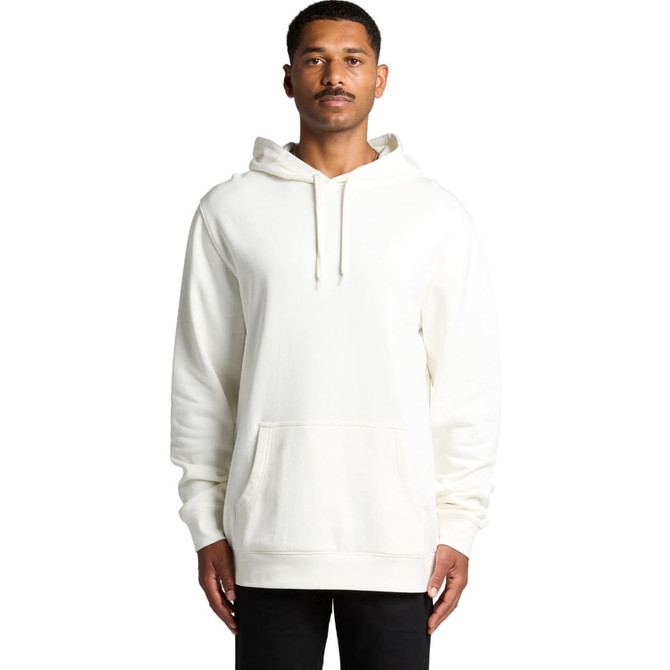 A man wearing an organic, cream-coloured hoodie with a front pocket and a hood. The hoodie has a logo.