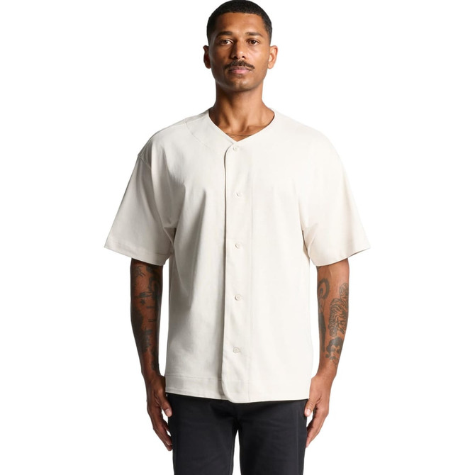 A heavy baseball jersey in a cream colour with a button front and short sleeves. It features a logo on the chest.
