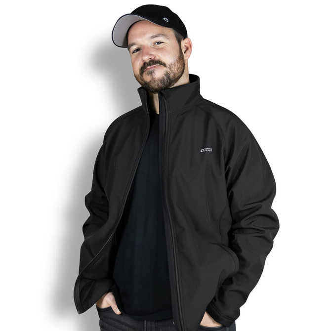 A man wearing a black Swiss Peak Urban Softshell Jacket with a branded logo, set against a plain background.