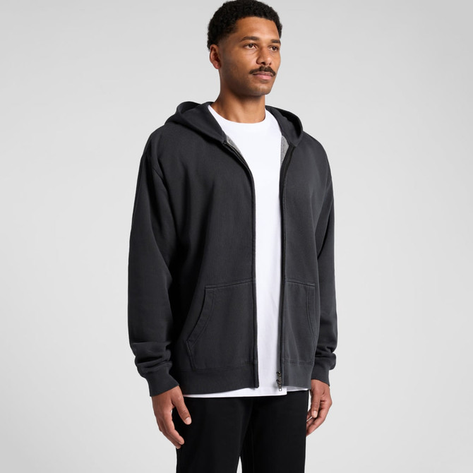 A black zip-up hoodie with a relaxed fit, featuring a hood and front pockets, worn over a white T-shirt.