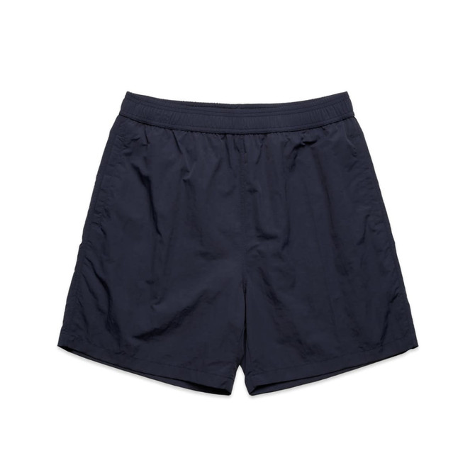 Navy blue swim shorts featuring an elastic waistband and a simple design. Includes a branded logo.