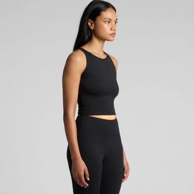 A black active crop tank top displayed on a model, featuring a fitted design and no visible branding.
