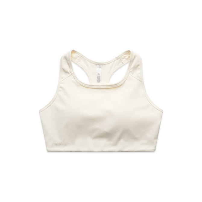 A cream-coloured crop top with a racerback design, featuring a logo.