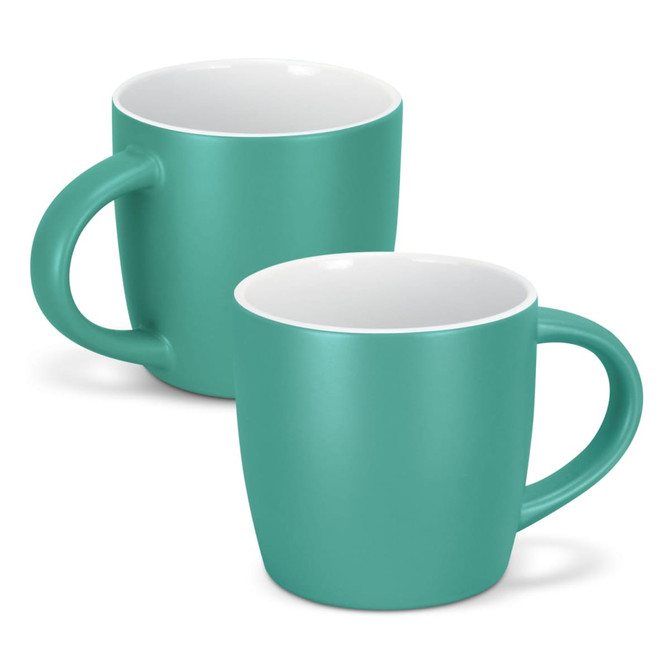 A coffee mug in teal with a contrasting white interior, featuring a handle and a smooth matte finish.