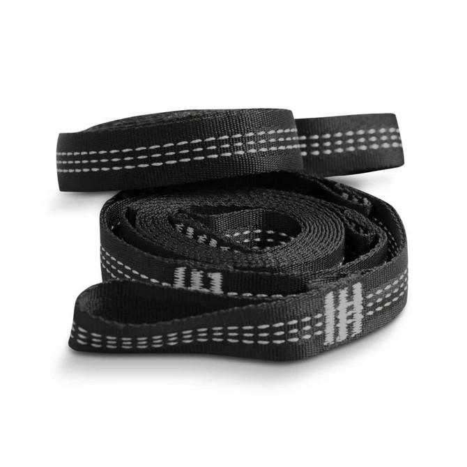 A set of black straps featuring white stitching patterns, coiled neatly together. The straps have a logo visible.