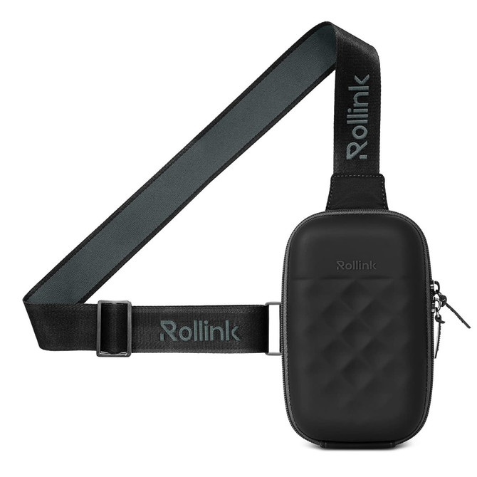 A compact black bag with a quilted texture, featuring an adjustable strap and a logo.