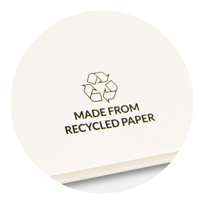An off-white notebook featuring a recycling symbol and text indicating it is made from recycled paper.