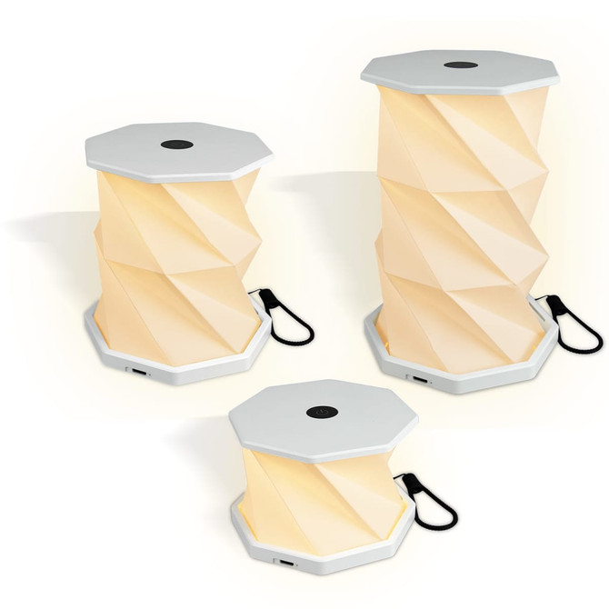 A foldable lantern in cream with a textured, hexagonal design, featuring a white base and a USB port.