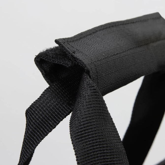 A black strap featuring durable fabric, designed for carrying or securing items.