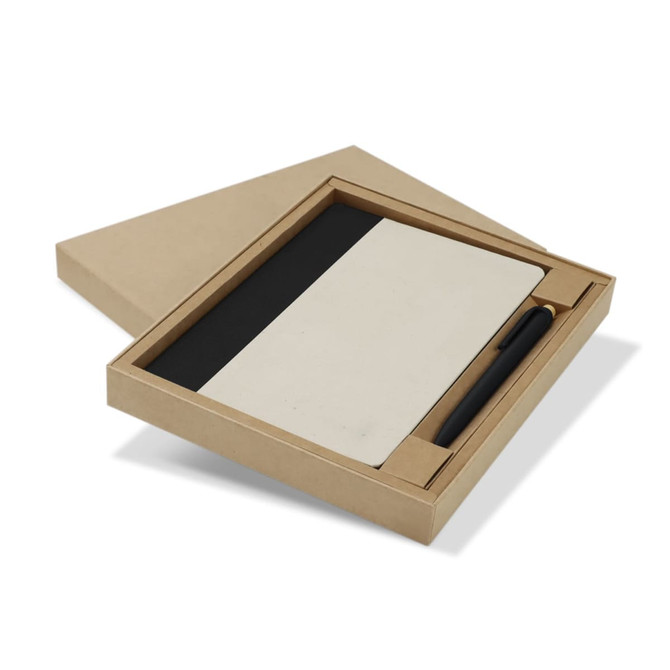 A notebook with a cream cover and a black pen, presented in a kraft gift box.