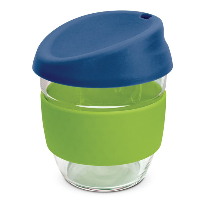 A drink bottle made of borosilicate glass, featuring a blue lid and a green silicone band for grip.