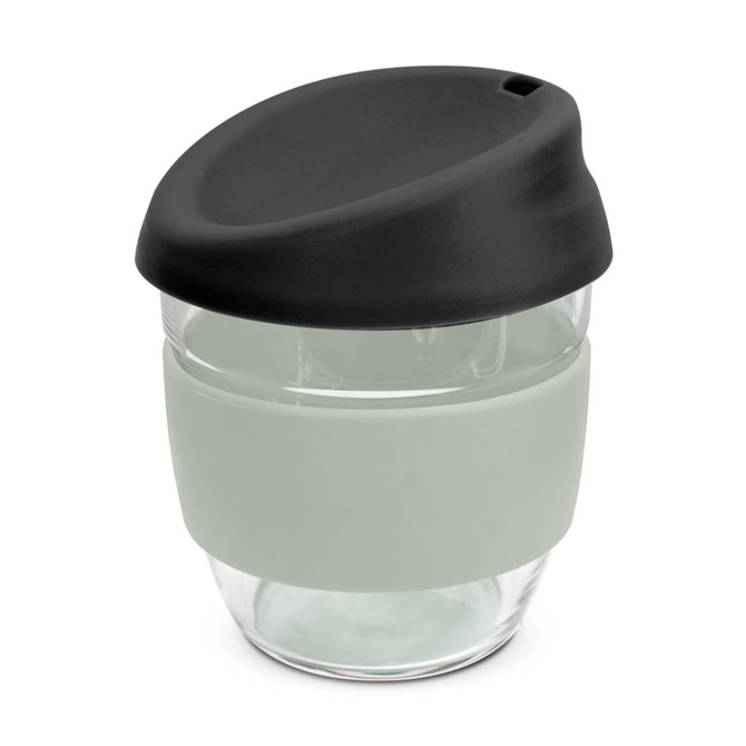 A drink bottle made of clear borosilicate glass with a black lid and grey silicone sleeve. Features a logo.