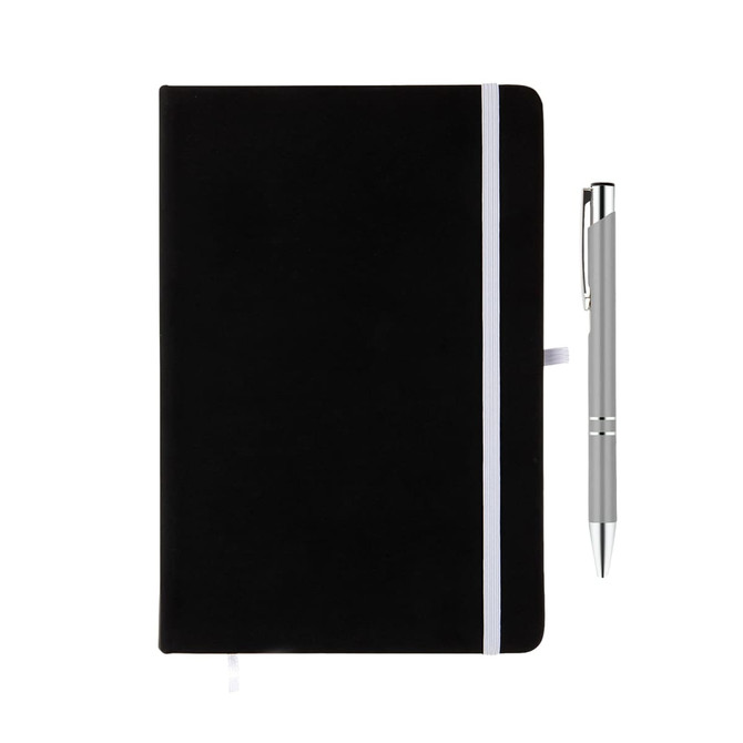 A black notebook with a white elastic band and a silver pen placed beside it. The notebook features a logo.