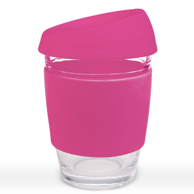 A reusable coffee cup with a pink silicone lid and a clear glass body, featuring a built-in logo.
