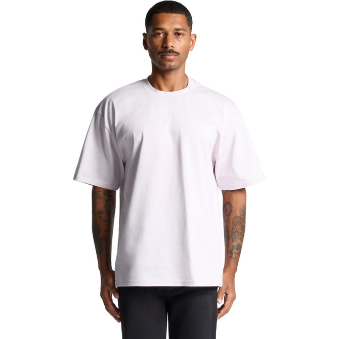 A plain light purple heavy tee shirt featuring short sleeves and a loose fit, displayed on a model.