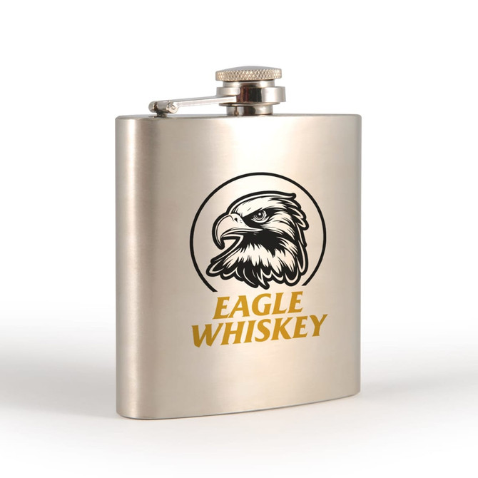A stainless steel hip flask featuring a circular eagle design and a logo, finished in a polished metallic colour.