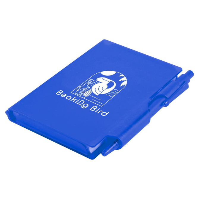 A blue Odyssey Pocket Notebook with a matching pen, featuring a design of a bird and a scenic background.