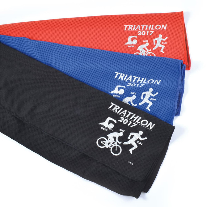 A set of three triathlon triangular flags in red, black, and blue, featuring a logo on each flag.